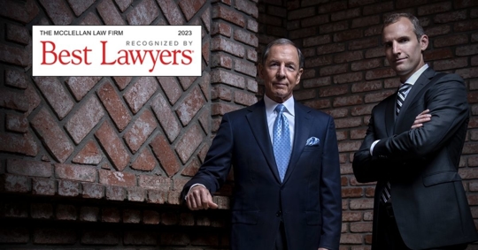 Photo of lawyers with Best Lawyers Badge